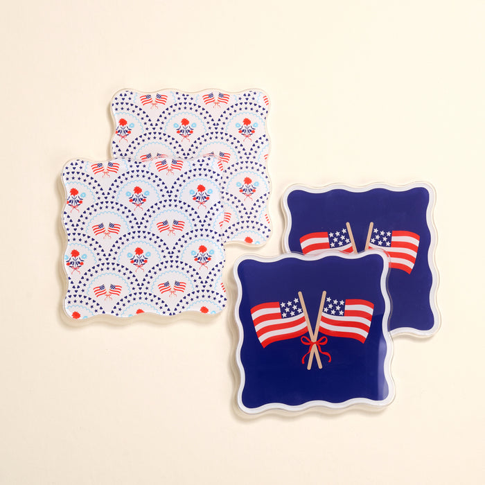 The Darling Effect All-American Darling Table Talk Acrylic Coaster Set includes four scalloped coasters—two with American flags and flowers on white, two with crossed flags on blue—perfect for patriotic table décor.