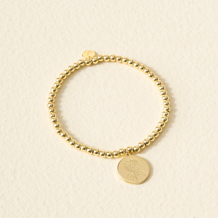 April / Gold