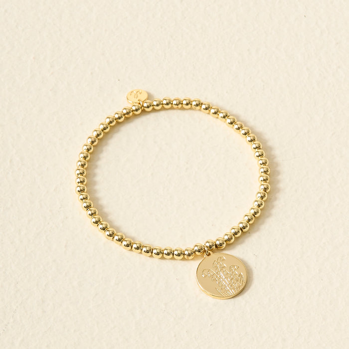 May / Gold