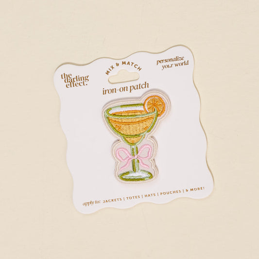 The Darling Effect's Bow-Tied Margarita Mix & Match Iron-On Patch is a colorful margarita glass with lime, on a wavy-edged card. Perfect for customizing jackets or bags—includes branding details and application tips.
