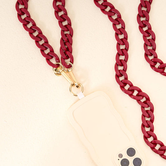 Show off your style on game day with The Darling Effect Burgundy Phone Chains, featuring a chunky burgundy strap attached to your phone case.