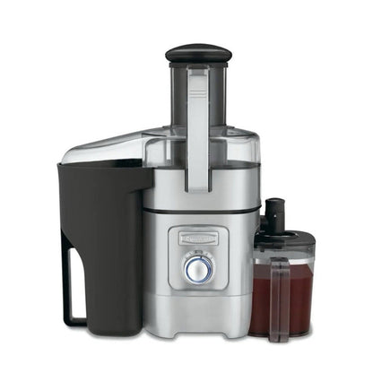 Catalog image of Cuisinart juice extractor with pulp container, filled juice pitcher and five-speed control dial.