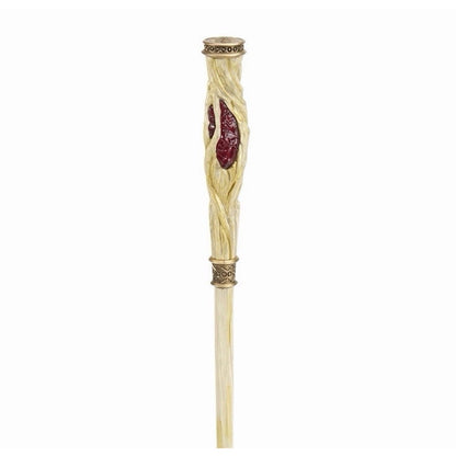 Upper section of the Pine wand, showing the textured cream handle, red inlays, and bronze-tone decorative bands.