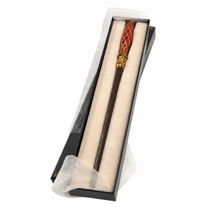 Redwood interactive wand with a red-and-gold lattice handle and brown shaft in its open presentation box.