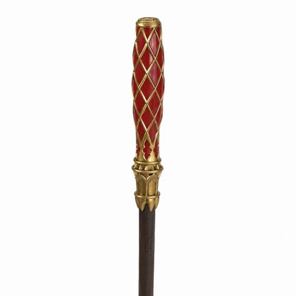 Close-up of the Redwood wand's red handle with gold-colored lattice and decorative collar.