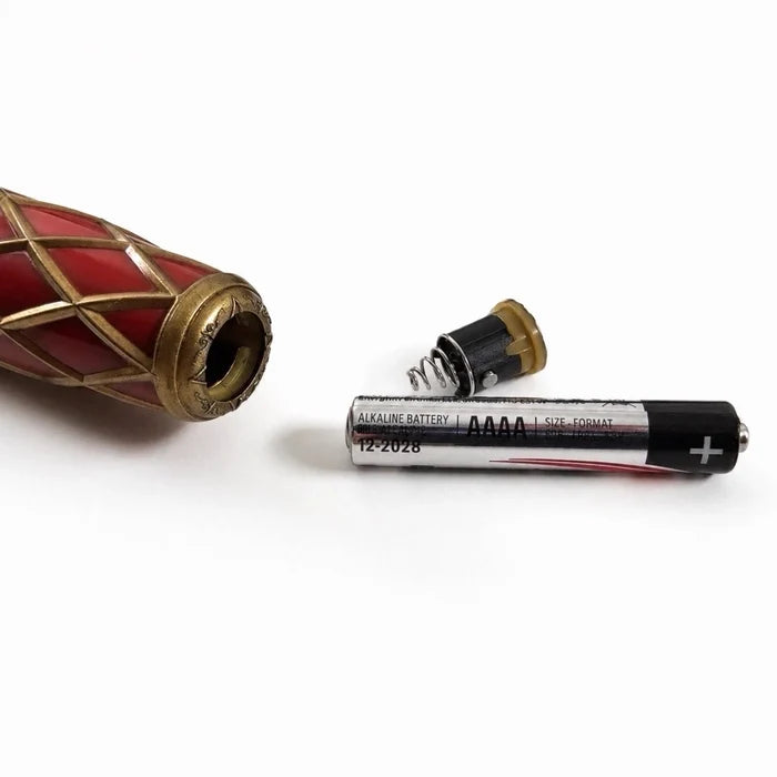 Redwood wand's open handle end, battery cap and AAAA battery.