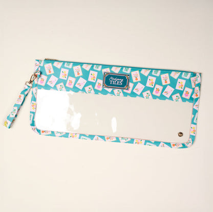 The Darling Effect's "It's Mahj Time" Teal Mahjong Tile Keeper Pouch features a blue and pink tile pattern, clear front, zipper closure, and wrist strap—perfect as a pencil case or chic Mahjong pouch for game nights.