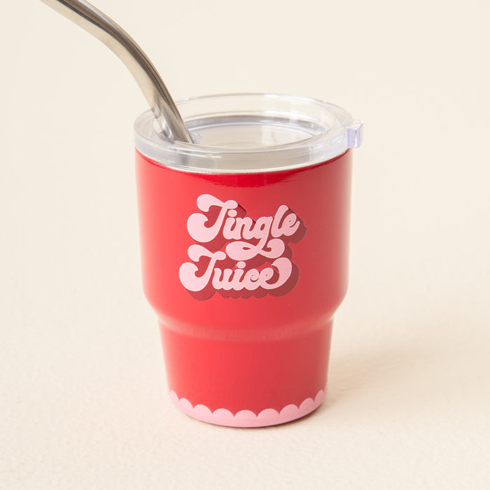 The-darling-effect Jingle Juice 2 oz Tiny Tumbler is a red insulated cup with a clear lid and metal straw, featuring playful white and pink "Jingle Juice" lettering and a scalloped pink base design.