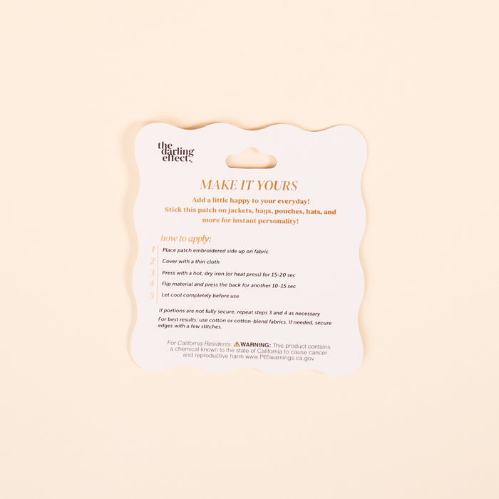 A square card with rounded edges shows Lemon Mix & Match Iron-On Patch application steps in black and orange on white. The Darling Effect’s “MAKE IT YOURS” headline encourages you to customize using the detailed instructions below.