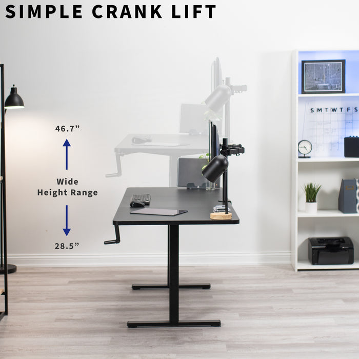 Large three-panel desktop at standing height in an office.