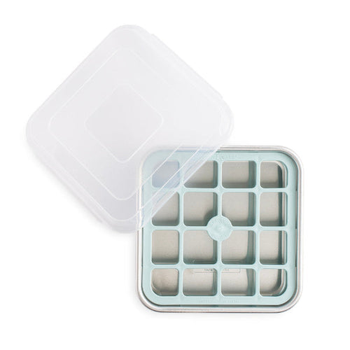 Ice cube tray with lid on a white background