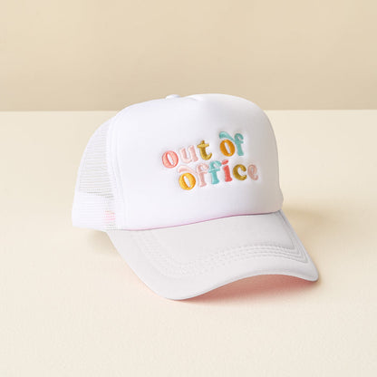 The Out of Office Trucker Hat by the-darling-effect features bold, colorful embroidered lettering—a stylish accessory that adds laid-back vibes and trendy flair to any look.