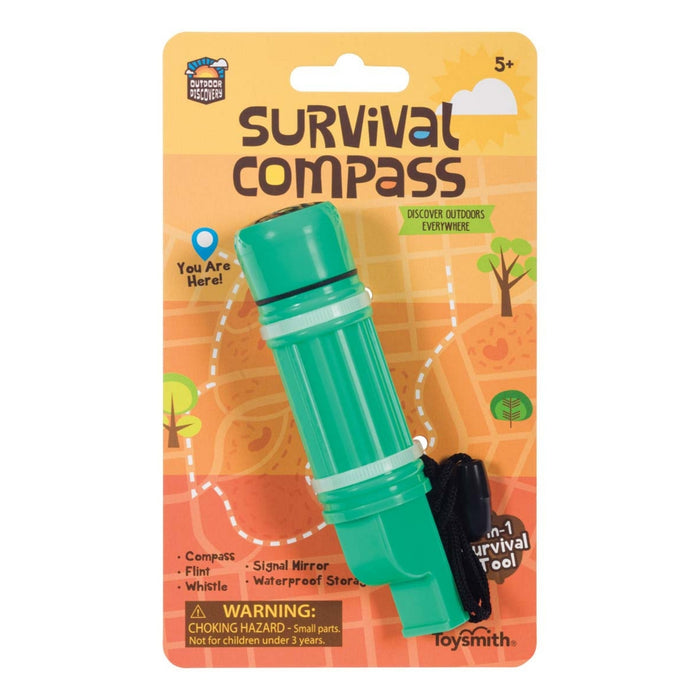A green kid-sized Outdoor Discovery Survival Compass by Outdoor Discovery includes a compass, flint, whistle, signal mirror, and waterproof storage in plastic packaging. Ideal survival tool for ages 5+ for outdoor adventures.