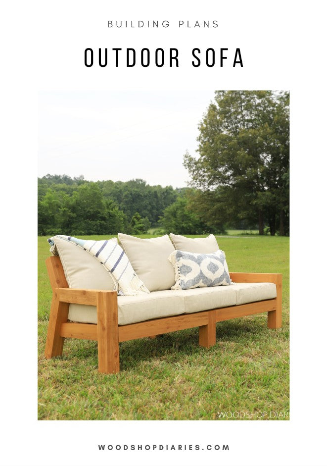 DIY outdoor sofa building plans cover – finished cedar sofa with cushions and throw pillows on a grass lawn