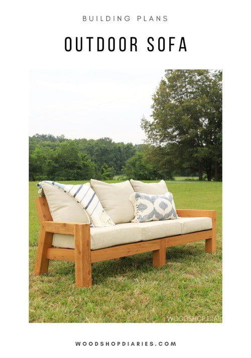 DIY outdoor sofa building plans cover – finished cedar sofa with cushions and throw pillows on a grass lawn