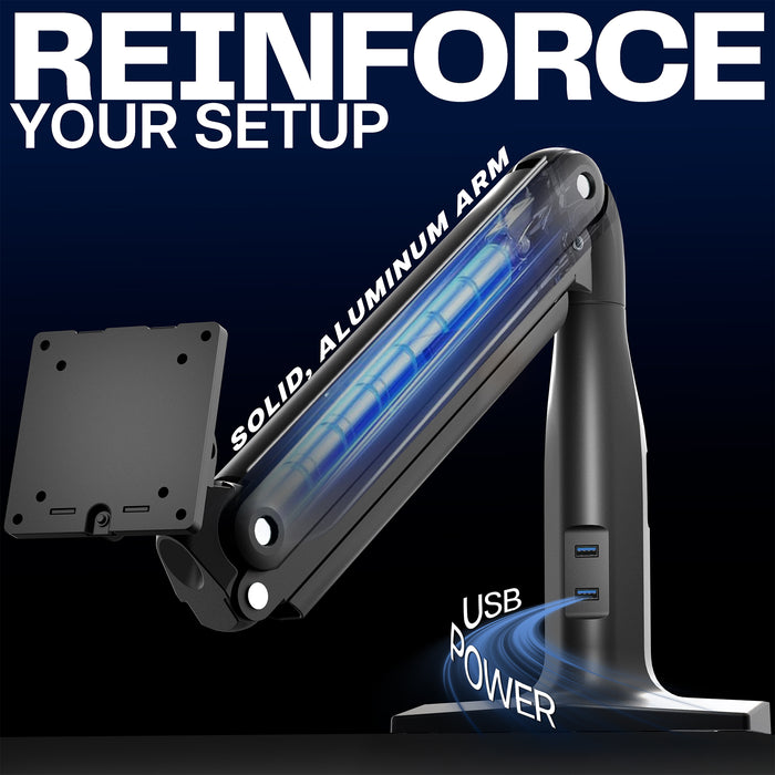 Black adjustable desk mount with USB power feature on a dark background, featuring text 'REINFORCE YOUR SETUP'.