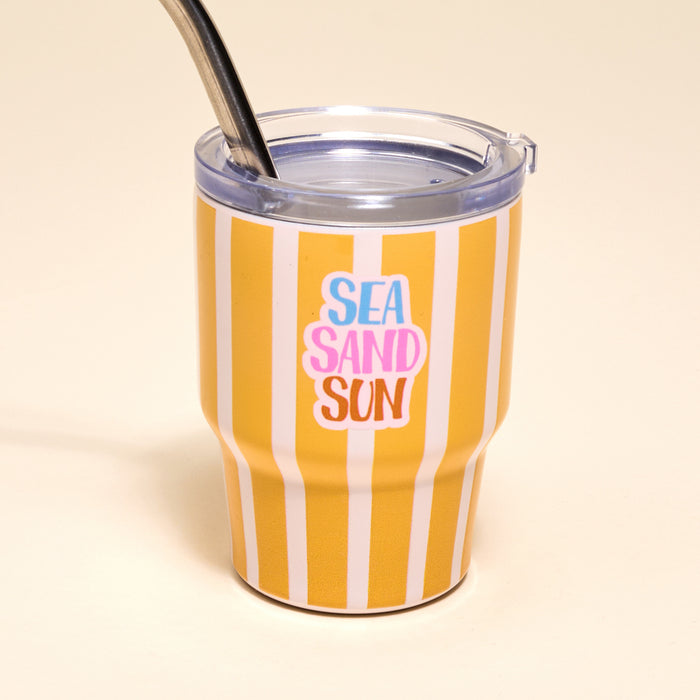 The Darling Effect Sea Sand Sun 2 oz Tiny Tumbler features yellow and white stripes, a clear lid, metal straw, and "SEA SAND SUN" text—perfect for sipping small drinks in style.