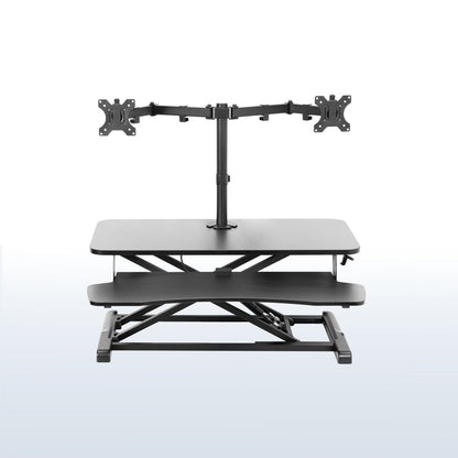 Sturdy height adjustable desk converter with articulating dual monitor mount.
