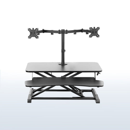 Sturdy height adjustable desk converter with articulating dual monitor mount.