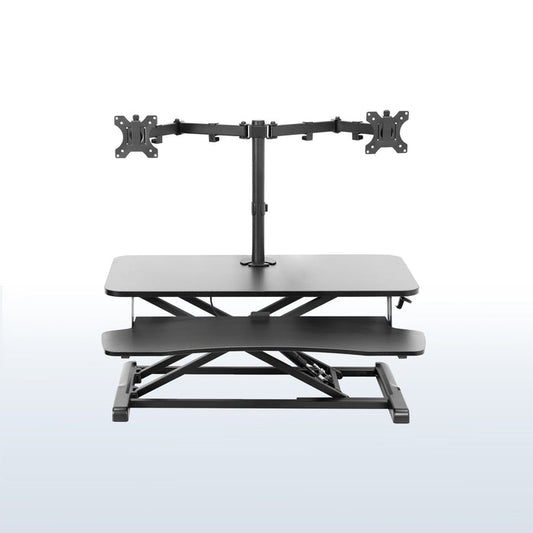 Sturdy height adjustable desk converter with articulating dual monitor mount.
