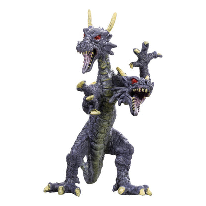 The Toysmith Magic Dragon Assorted by Toysmith features a two-headed dragon with dark purple scales, gold claws and horns, red eyes, and an aggressive stance—an ideal fantasy toy for imaginative play against a white background.