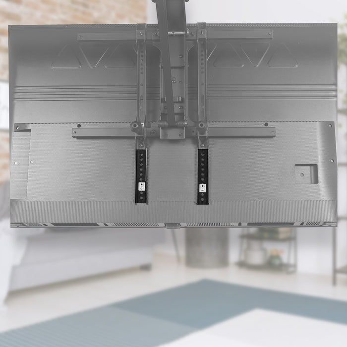 Vertical overhead VESA plate extender brackets.