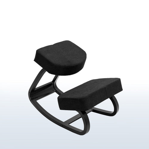 Rocking all-black kneeling chair.